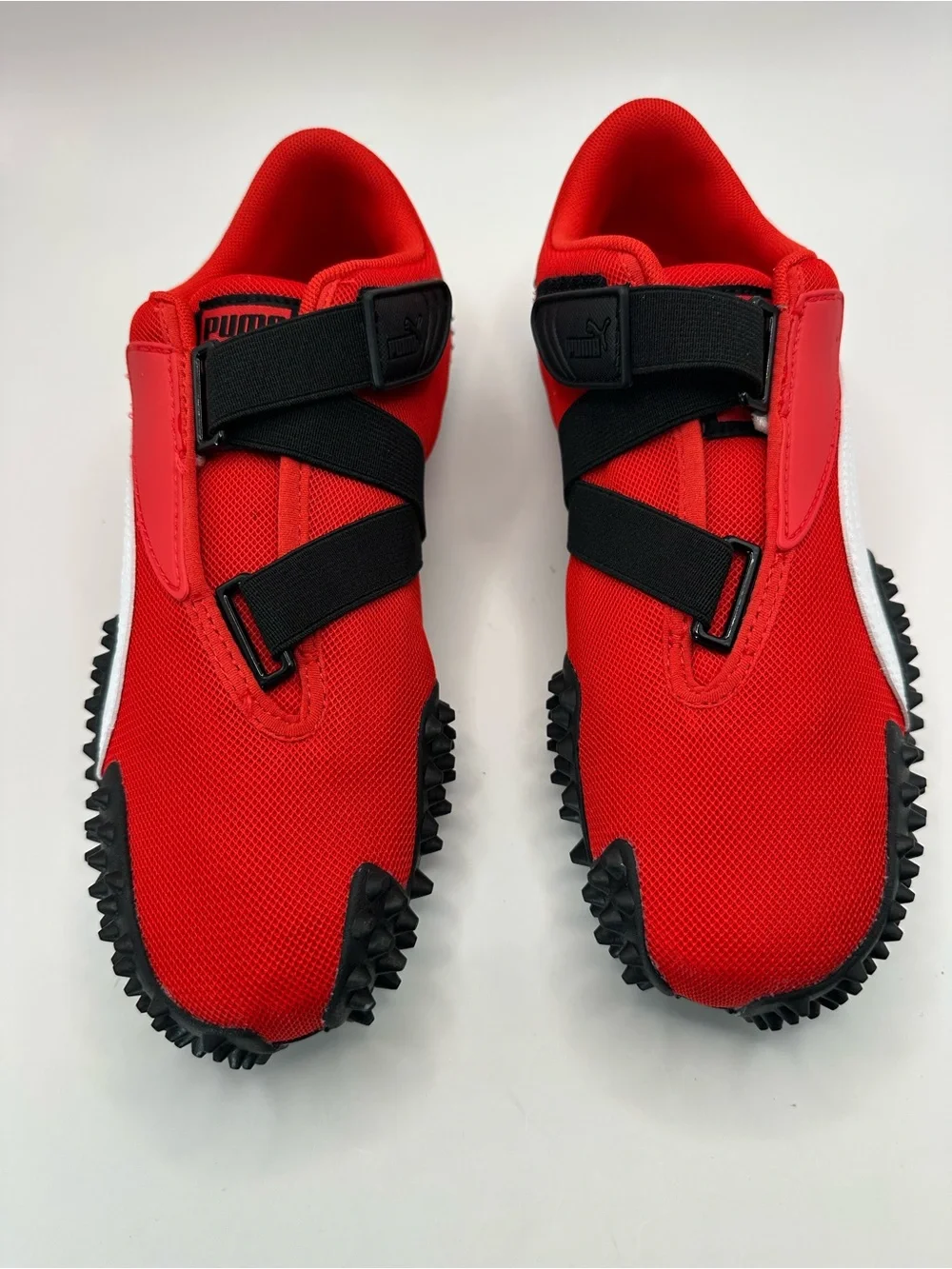 Puma Red and White Spike-Style Athletic Sneakers visible defects